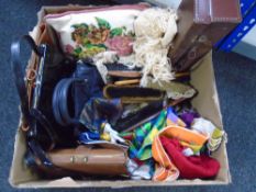 A box of lady's hand bags, embroidered cushion,