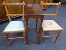 An oak occasional table together with a pair of Edwardian bedroom chairs