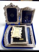 A tray of silver plated photograph frames and a Laura Ashley frame.