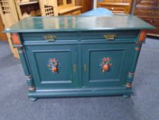 A 19th century oak double door sideboard with pillar supports (painted)