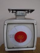 A set of post office scales.