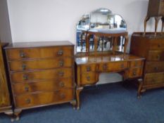 A 20th century walnut Queen Anne-style dressing table with triple mirror and stool together with