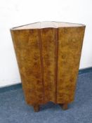 An Art Deco burr walnut double door cabinet