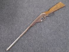 A mid-20th century Daisy lever action air rifle.