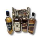 Four Bottles of Scotch Whisky : Johnnie Walker Black Label, 70 cl, Johnnie Walker Red Label, 70 cl,