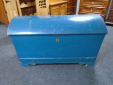 A 19th century painted oak dome topped shipping trunk