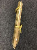 A set of 18 Victorian brass stair rods.