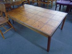 A 20th century Danish tile topped coffee table.