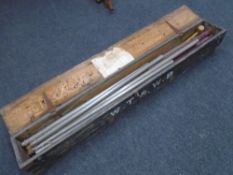 A vintage Partridges portable bell stand in wooden case.