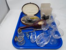 A tray of maracca, onyx terrier bookends,