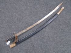 A reproduction Indian sabre.