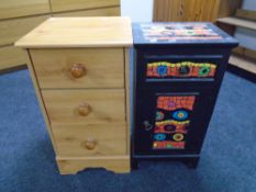 A painted bedside cabinet together with a pine-effect three drawer chest