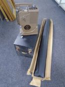 A vintage Specto projector and screen