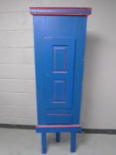 A 19th century pine painted corner cabinet