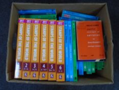 A box of Stanley Gibbons stamp catalogues.