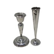 A loaded silver vase and a slender vase lacking its base, vase 15cm high.