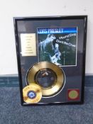 An Elvis Presley special edition Hound Dog record montage.