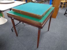 Three folding card tables