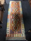 A Chobi kilim runner 198 cm x 64 cm
