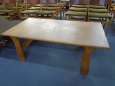 A pine refectory coffee table.