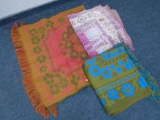 A box containing three assorted woolen rugs and throws together with three 20th century light