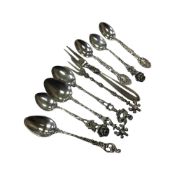 A group of continental white metal spoons and forks, some stamped 800, 835.