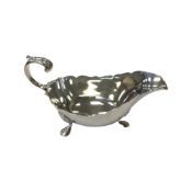 A silver milk jug, London 1899, length 14cm. CONDITION REPORT: 114g.