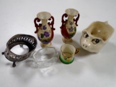 A Royal Worcester miniature gilded mug decorated with rose sprays,