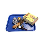 A gent's wristwatch, a pen signed Cartier, a white metal beaker, a Victorian silver-mounted inkwell,