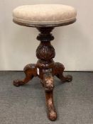 A late Victorian revolving piano stool
