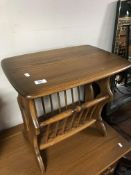 An Ercol elm and beech magazine table.