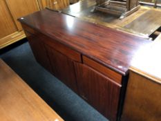 A Skovby triple door sideboard