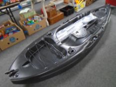 A Marine kayak with oars.