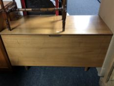 A mid-20th century teak blanket box.