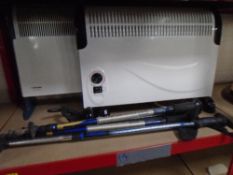 Four walking poles together with two electric panel heaters.