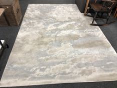 A contemporary rug, 291cm by 204cm.