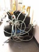 A SGS air compressor with hose.