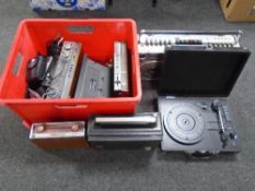 A box containing a quantity of assorted transistor radios including Bush, Europa,