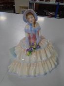 A Royal Doulton figure Day Dreams HN 1731