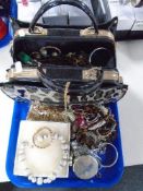 A tray of handbag containing costume jewellery etc