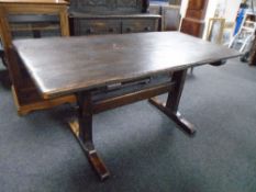 An oak refectory dining table.