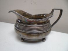 A 19th century Newcastle silver milk jug, 125.