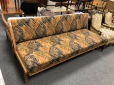 A mid century Scandinavian wooden framed day bed