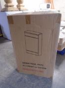 A Sienna white WC cabinet with cistern.