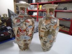 A pair of Japanese Satsuma vases (height 37.5cm).