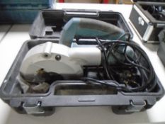 An Erbauer electric hand saw, cased.