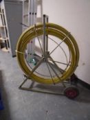 A duct rod on trolley.