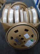 A box containing spools of PC broadband fibre cable