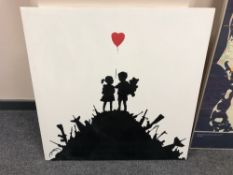 A canvas print after Banksy : Kids on Guns, 76cm by 76cm.