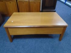 A Sutcliffe furniture cantilever storage coffee table.